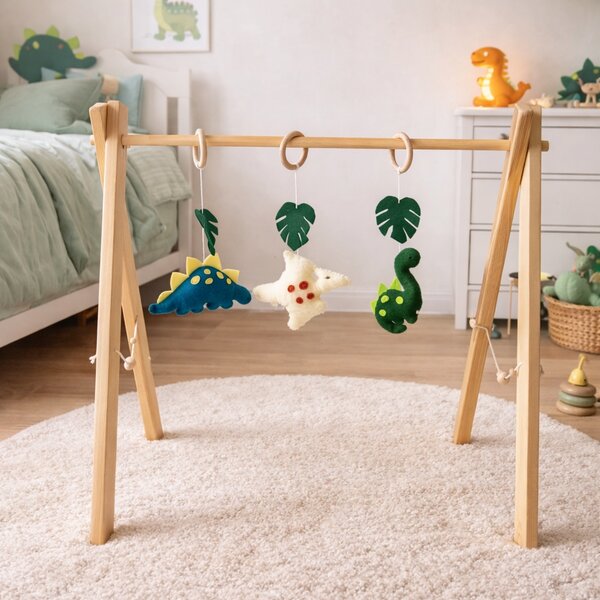 Baby Gym Dinozaury – drewniany stojak Montessori dla niemowląt