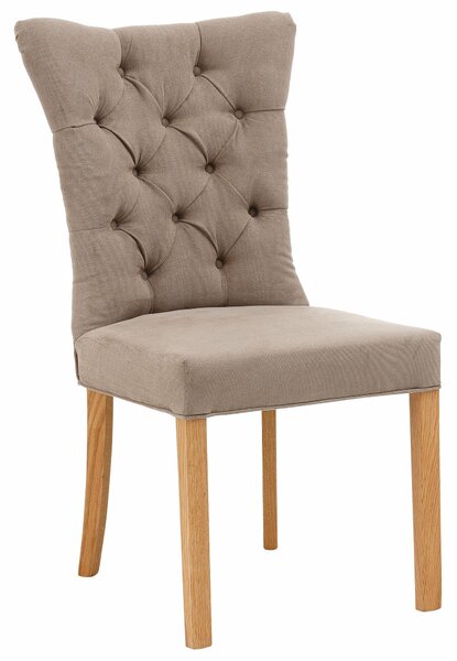 Stylowy fotel z pikowaniem w minimalistycznym stylu