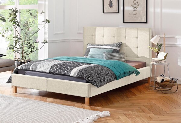 Tapicerowane łóżko 140x200 cm w kolorze kremowym