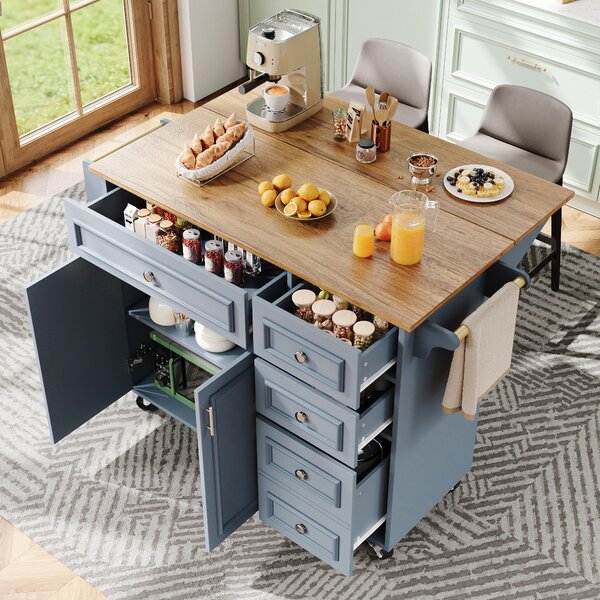 Wyspa kuchenna z miejscem do przechowywania, składana wyspa kuchenna wykonana z MDF i metalu, w kolorze baby blue (jasnoniebieskim), o wymiarach 110 x 75 x 92 cm, z funkcją stołu jadalnego i szufladami