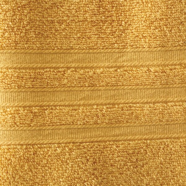 Żółty bawełniany ręcznik frotte 50x85 cm Zero Twist – Catherine Lansfield