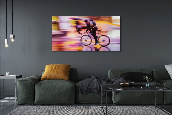Obraz canvas na ścianę Rowerzysta w Blasku Świateł