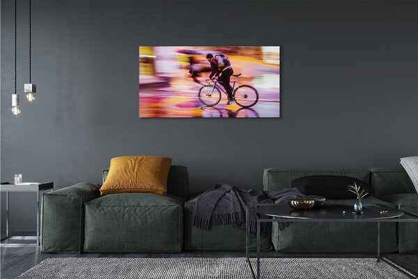 Obraz canvas na ścianę Rowerzysta w Blasku Świateł
