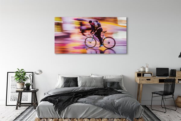 Obraz canvas na ścianę Rowerzysta w Blasku Świateł