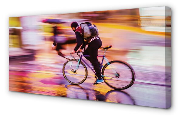 Obraz canvas na ścianę Rowerzysta w Blasku Świateł