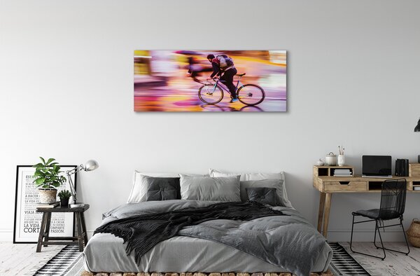 Obraz canvas na ścianę Rowerzysta w Blasku Świateł