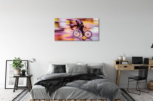 Obraz canvas na ścianę Rowerzysta w Blasku Świateł