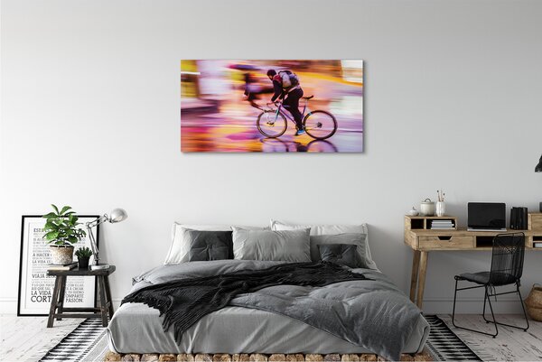 Obraz canvas na ścianę Rowerzysta w Blasku Świateł