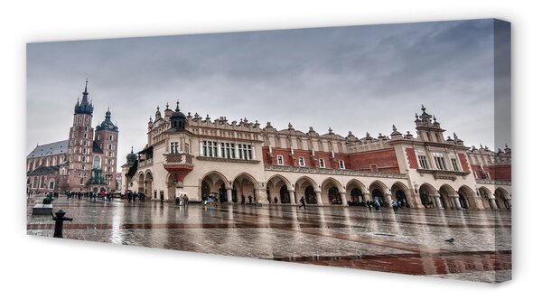 Zdjęcie na płótnie Deszczowy Kraków: Sukiennice i Kościół
