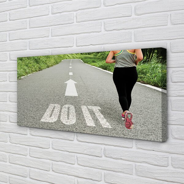 Obraz canvas na ścianę Kobieta Biegnąca Drogą