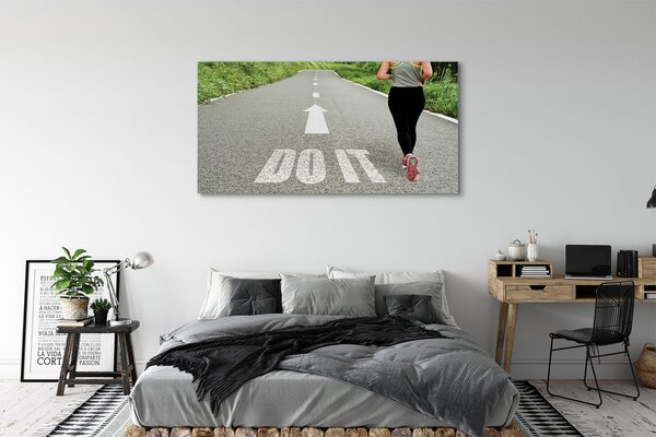 Obraz canvas na ścianę Kobieta Biegnąca Drogą