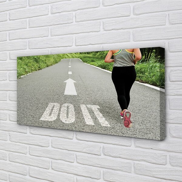 Obraz canvas na ścianę Kobieta Biegnąca Drogą
