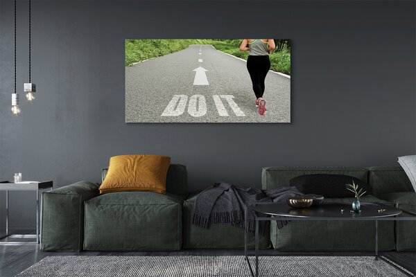 Obraz canvas na ścianę Kobieta Biegnąca Drogą