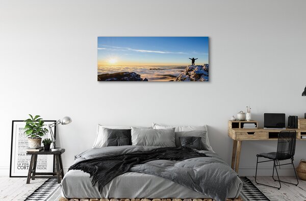 Obraz canvas na ścianę Człowiek w Górach o Wschodzie