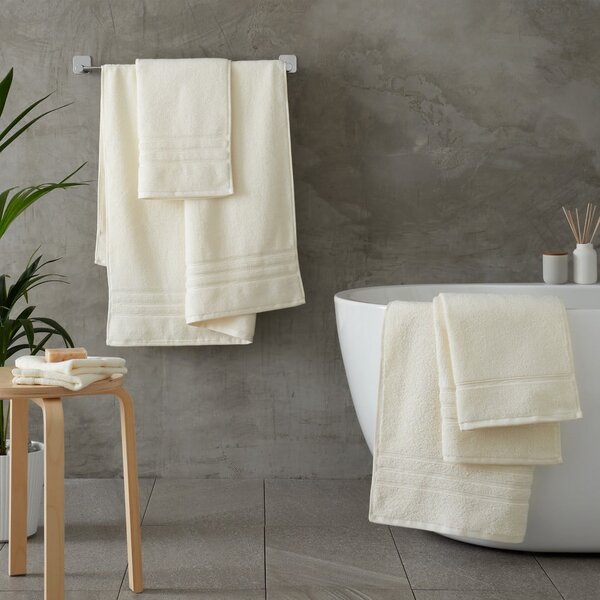 Kremowy bawełniany ręcznik frotte 50x85 cm Zero Twist – Catherine Lansfield