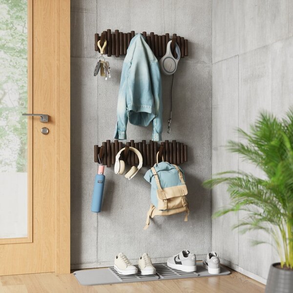 Ciemnobrązowy wieszak ścienny z litego drewna sosnowego 61 cm Picket – Umbra