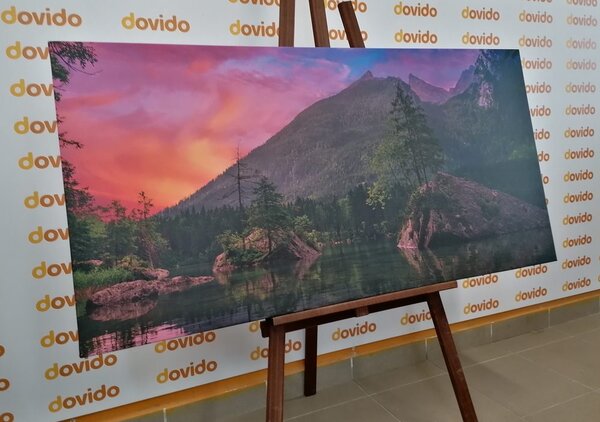 Obraz zachód słońca nad górskim krajobrazem