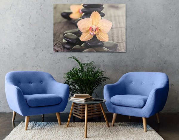 Obraz żółta orchidea i kamienie Zen