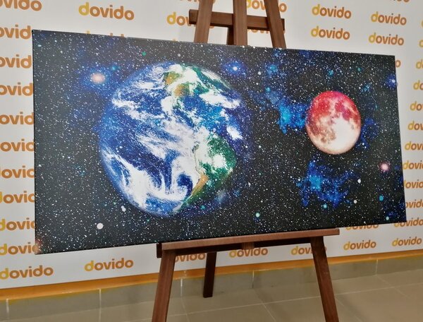 Obraz planeta Ziemia i czerwony księżyc
