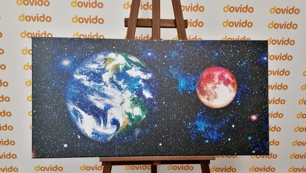 Obraz planeta Ziemia i czerwony księżyc
