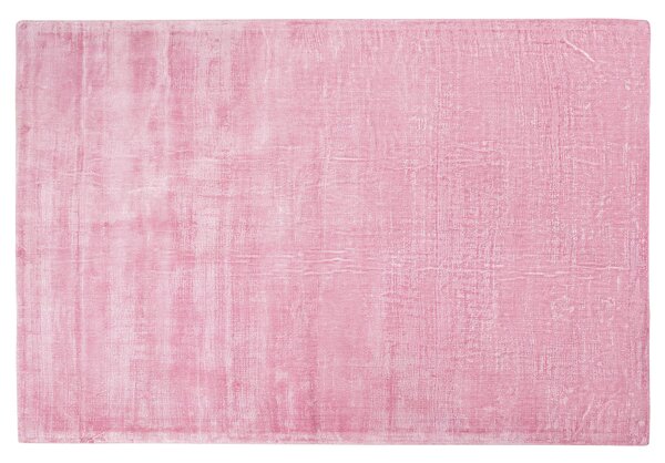 Nowoczesny dywan z wiskozy krótkie włosie prostokątny 140 x 200 cm różowy Gesi Beliani