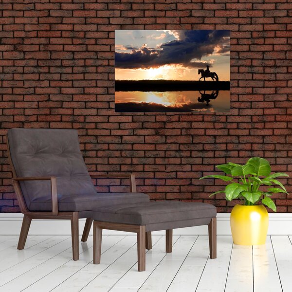 Obraz - Jeździec na koniu o zachodzie słońca (70x50 cm)
