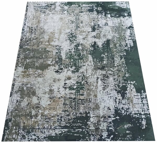 Prostokątny szary dywan w industrialnym stylu - Sellu 10X