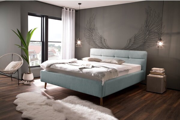 Jasnoniebieskie tapicerowane łóżko dwuosobowe ze schowkiem ze stelażem 160x200 cm Lotte – Meise Möbel