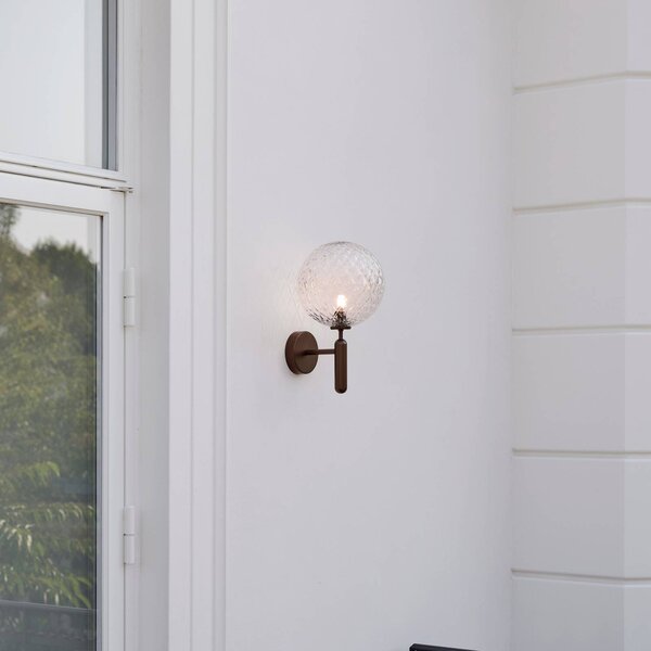 Nuura Aps lampa zewnętrzna Miira, Ø 20 cm, ciemny brąz/przezroczysty możliwość ściemniania, brązowy / mosiężny, metal, skandynawski