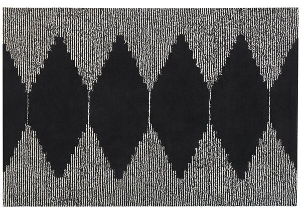 Dywan bawełniany geometryczny wzór 140 x 200 cm czarno-biały Tirupatii Beliani