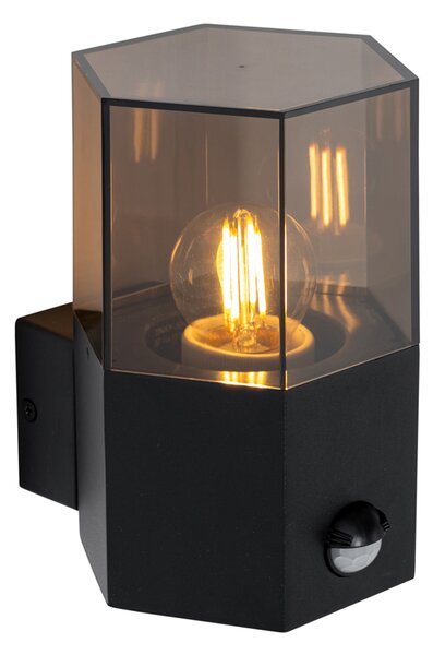 Lampa ścienna zewnętrzna czarna z przydymionym szkłem sześciokątnym i czujnikiem ruchu - Denmark