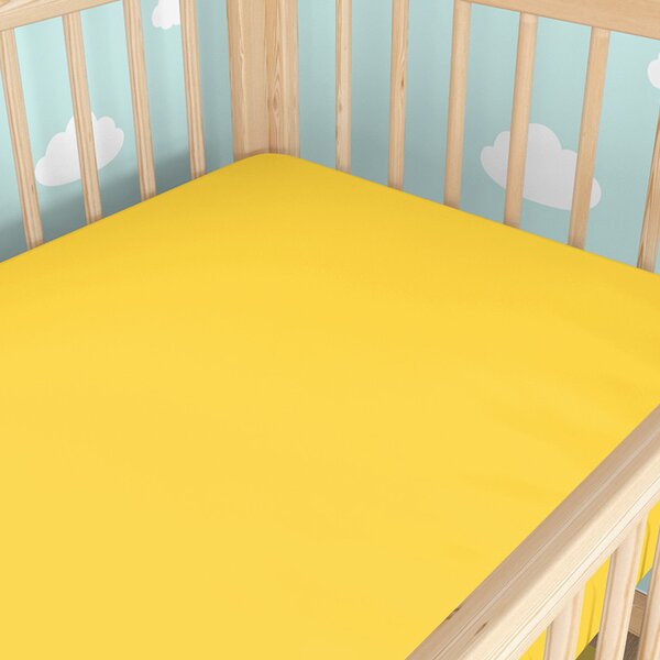 Goldea bawełniane prześcieradło z gumką do łóżeczka - żółte 60 x 120 cm