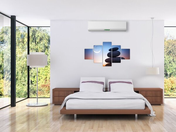 Obraz ułożonych kamieni jeden na drugim (125x70 cm)