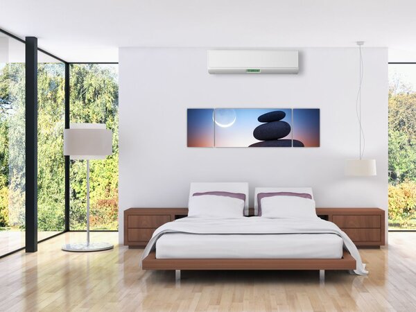 Obraz ułożonych kamieni jeden na drugim (170x50 cm)