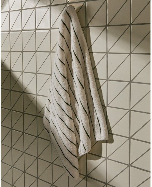 Zielony/beżowy bawełniany ręcznik frotte 50x90 cm Dorane – Kave Home
