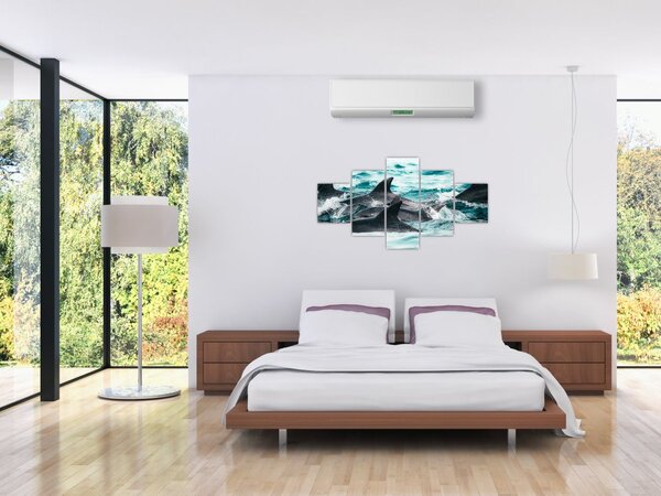 Obraz - Delfiny w oceanie (125x70 cm)