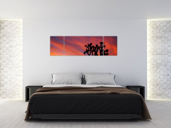 Obraz zachodu słońca nad sylwetką drzewa (170x50 cm)