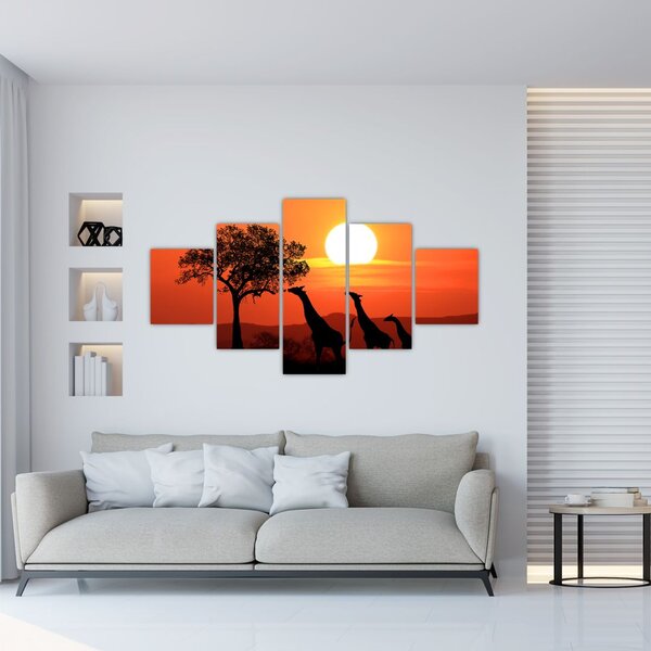 Obraz żyraf o zachodzie słońca (125x70 cm)