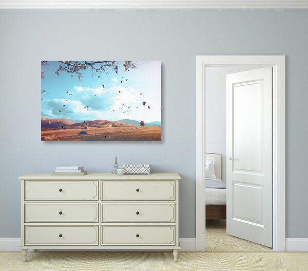 Obraz opadających liści w jesiennym krajobrazie