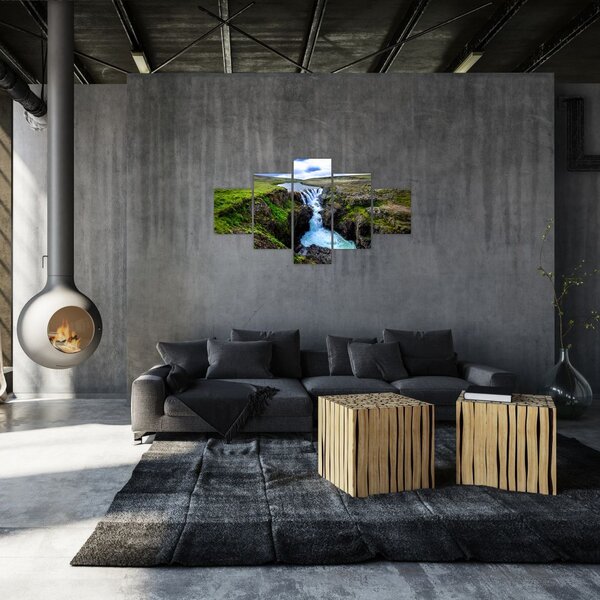 Obraz wodospadu między skałami (125x70 cm)