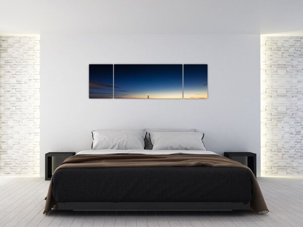 Obraz latarni morskiej w oddali (170x50 cm)
