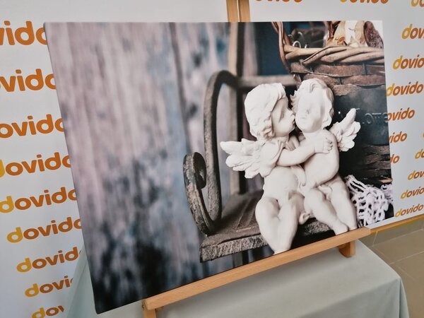 Obraz figurki aniołów na ławce