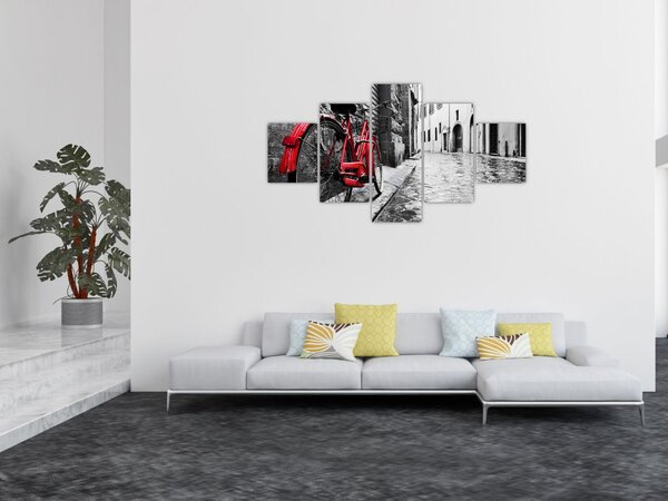 Obraz czerwonego roweru na brukowanej uliczce (125x70 cm)