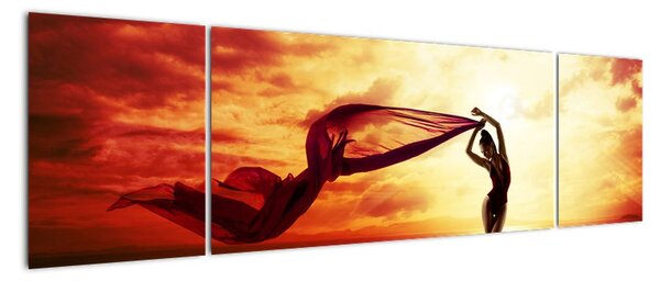 Obraz - Sylwetka kobiety o zachodzie słońca (170x50 cm)
