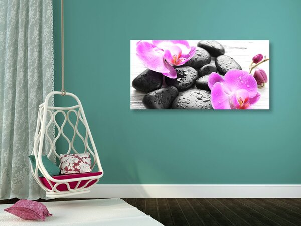 Obraz magiczna gra kamieni i orchidei