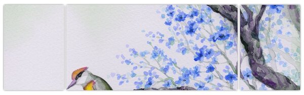 Obraz - ptak na drzewie z niebieskimi kwiatami (170x50 cm)