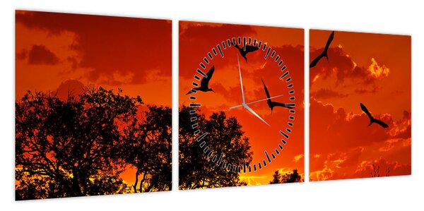 Obraz ptaków o zachodzie słońca (z zegarem) (90x30 cm)