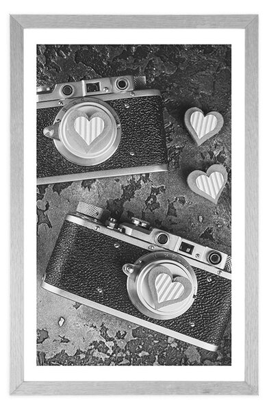 Plakat z passe-partout dwa retro aparaty fotograficzne w czerni i bieli