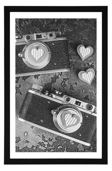 Plakat z passe-partout dwa retro aparaty fotograficzne w czerni i bieli