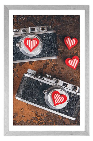 Plakat z passe-partout dwa retro aparaty fotograficzne